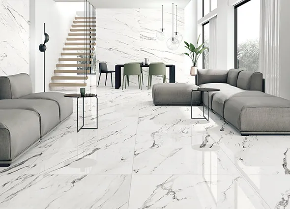 Luxurious living room with professional tile flooring services in Willoughby OH, featuring a staircase and modern interior design.